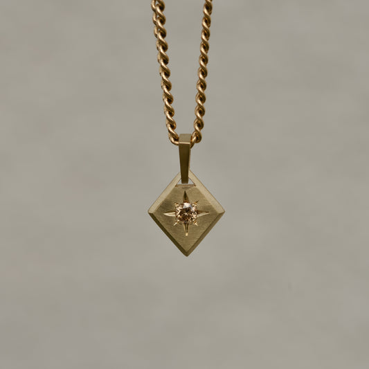 11: Lozenge Star-set charm, diamond