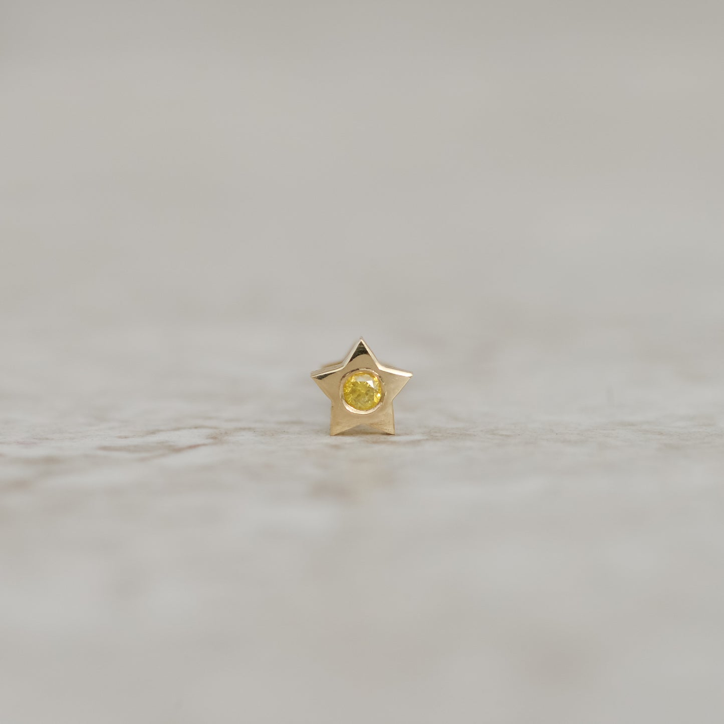 12: Star Token Flat-back Piercing Stud - single