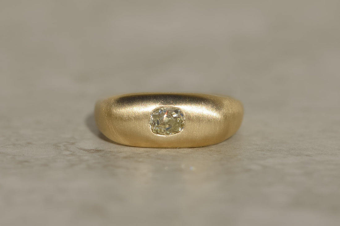 studio molimo chunky ring with an old mine cut diamond in brushed yellow gold