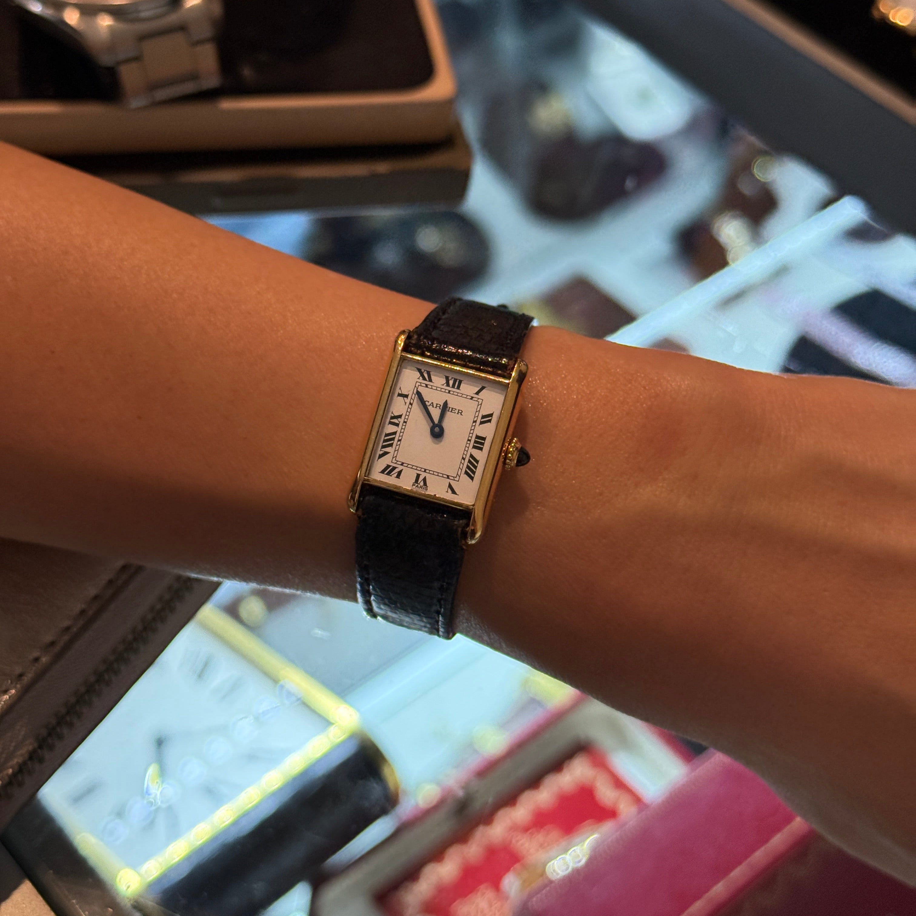 Person wearing a vintage Cartier Tank