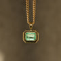 Natural emerald pendant bezel-set in chunky 14k gold 