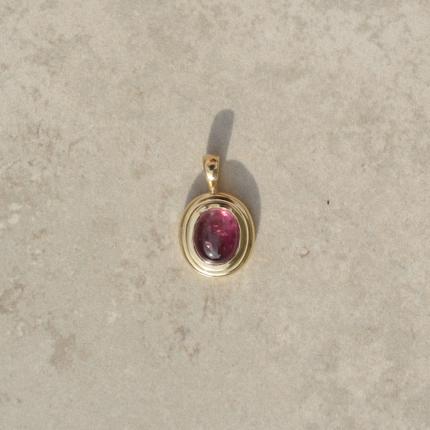 09: Bubble Bezel Pendant, pink tourmaline cabochon