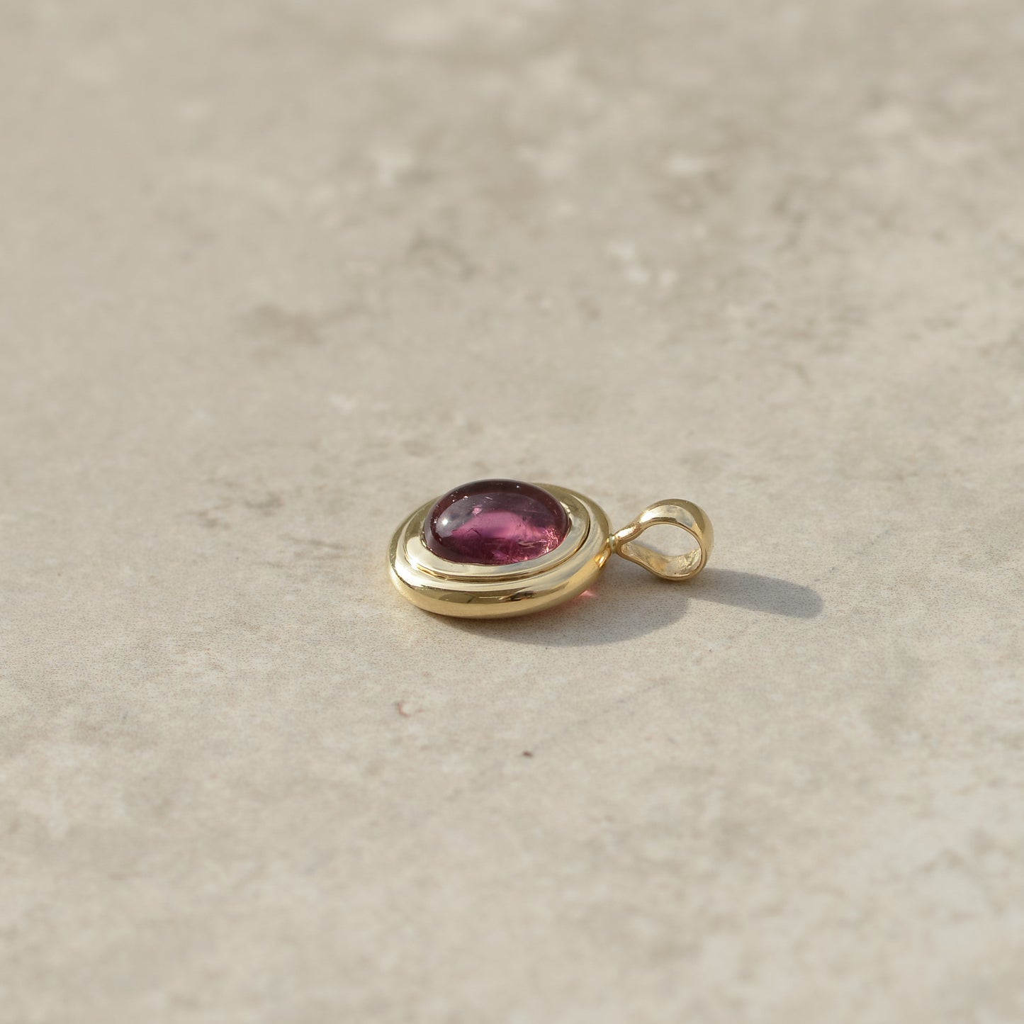 09: Bubble Bezel Pendant, pink tourmaline cabochon