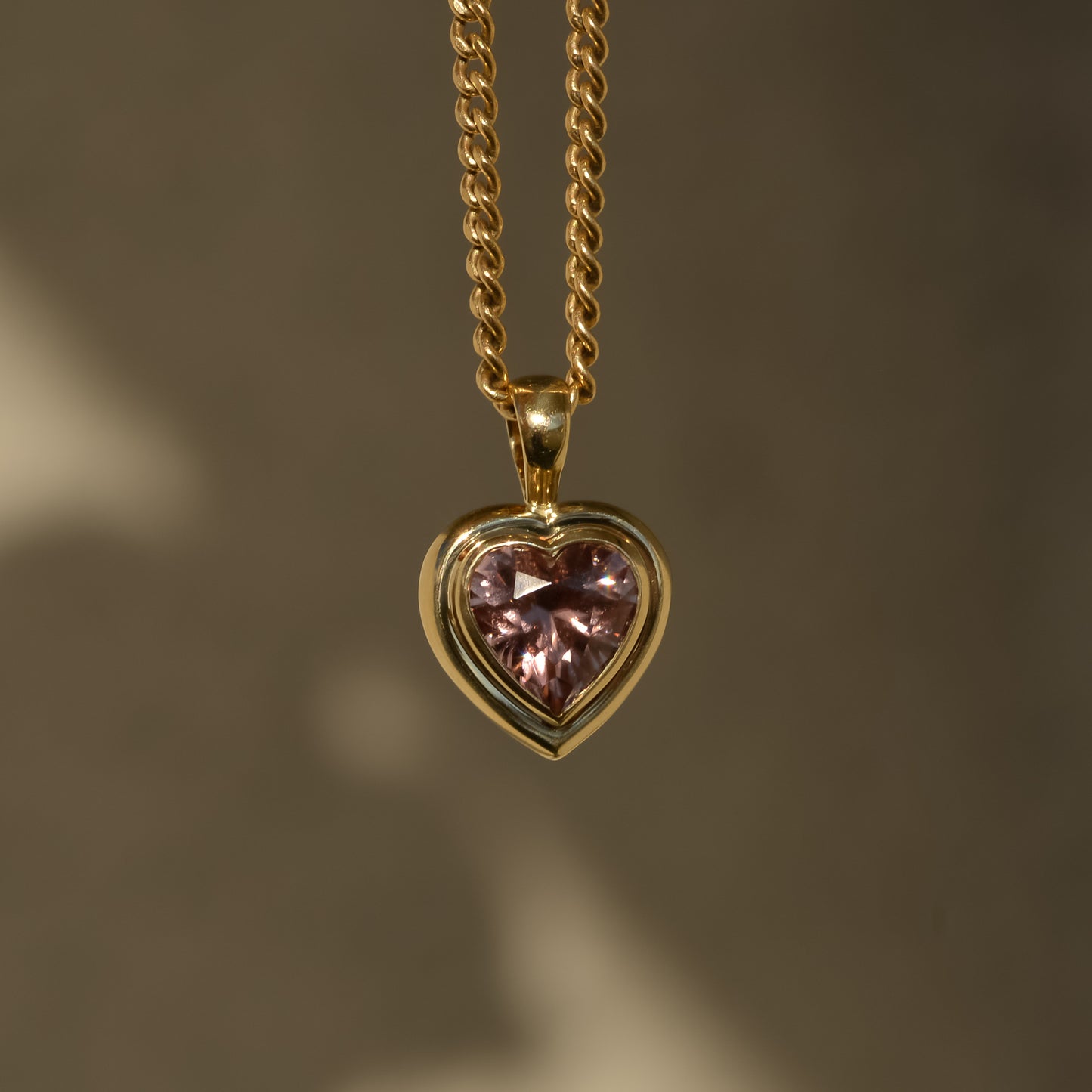 09: Bubble Bezel Pendant, pink zircon