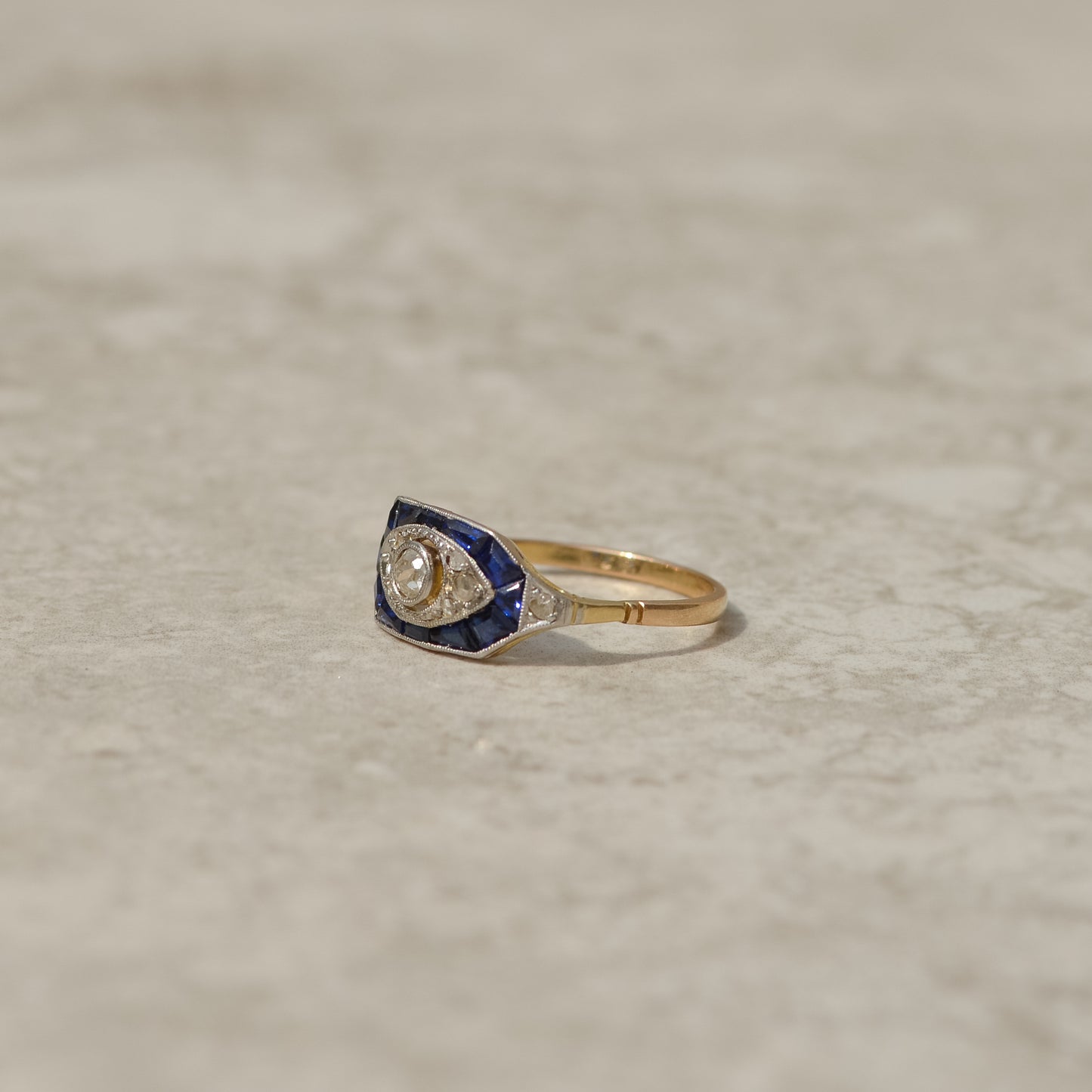 Art Deco Calibré Cut Sapphire and Diamond Eye Ring
