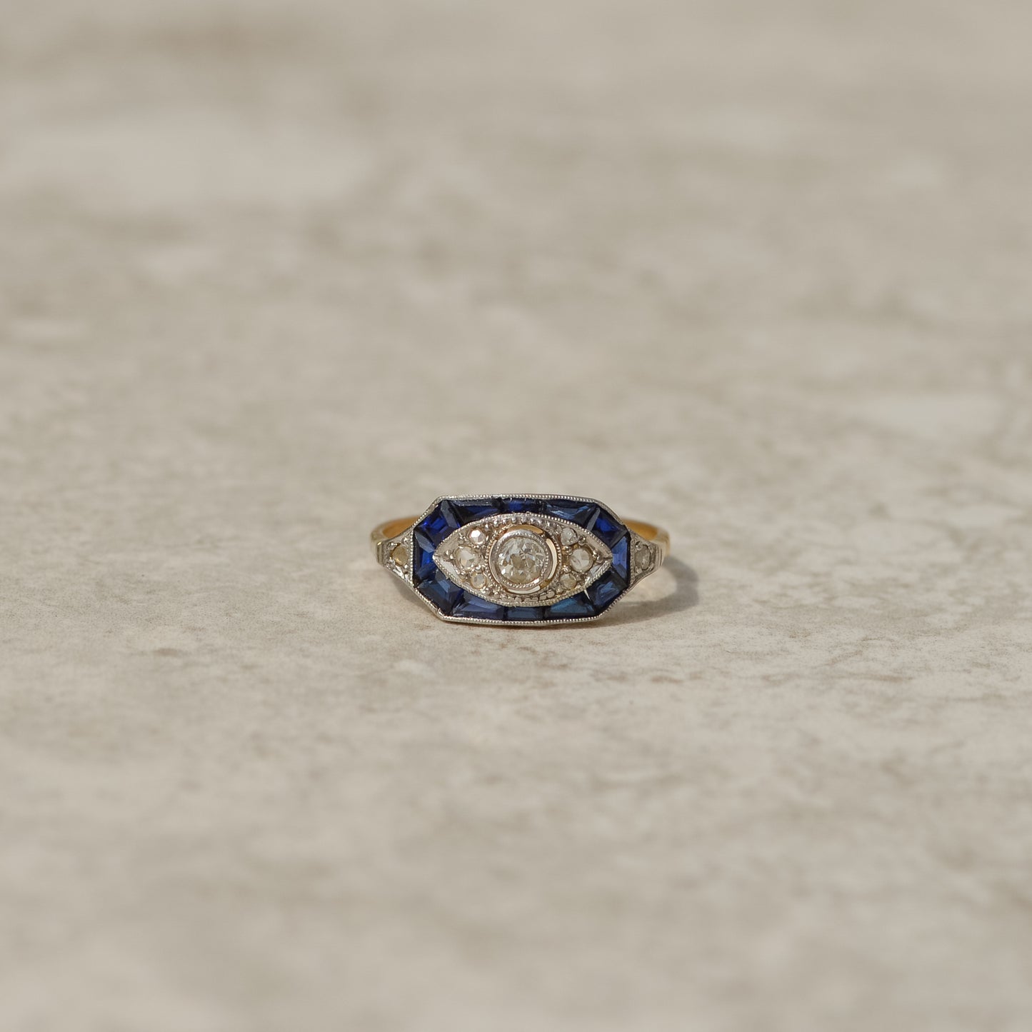 Art Deco Calibré Cut Sapphire and Diamond Eye Ring
