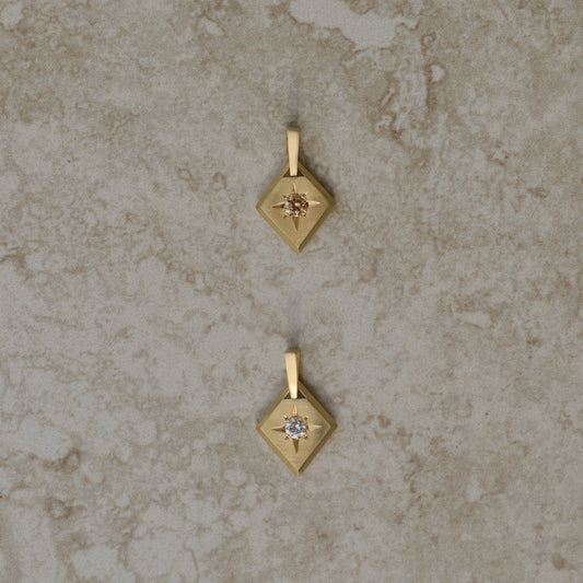 11: Lozenge Star-set charm, diamond