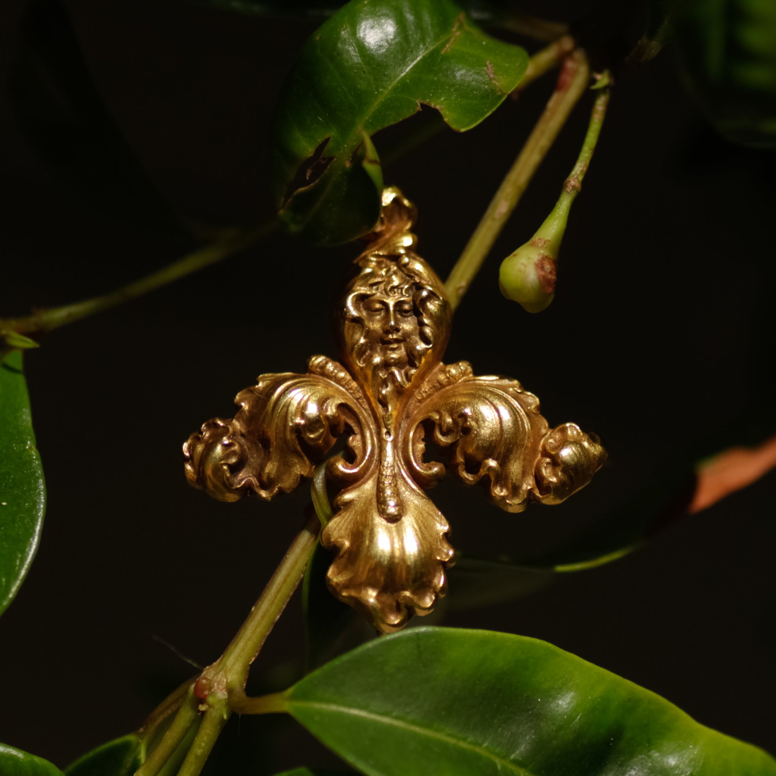 Antique Art Nouveau Iris with Cherub Face Brooch
